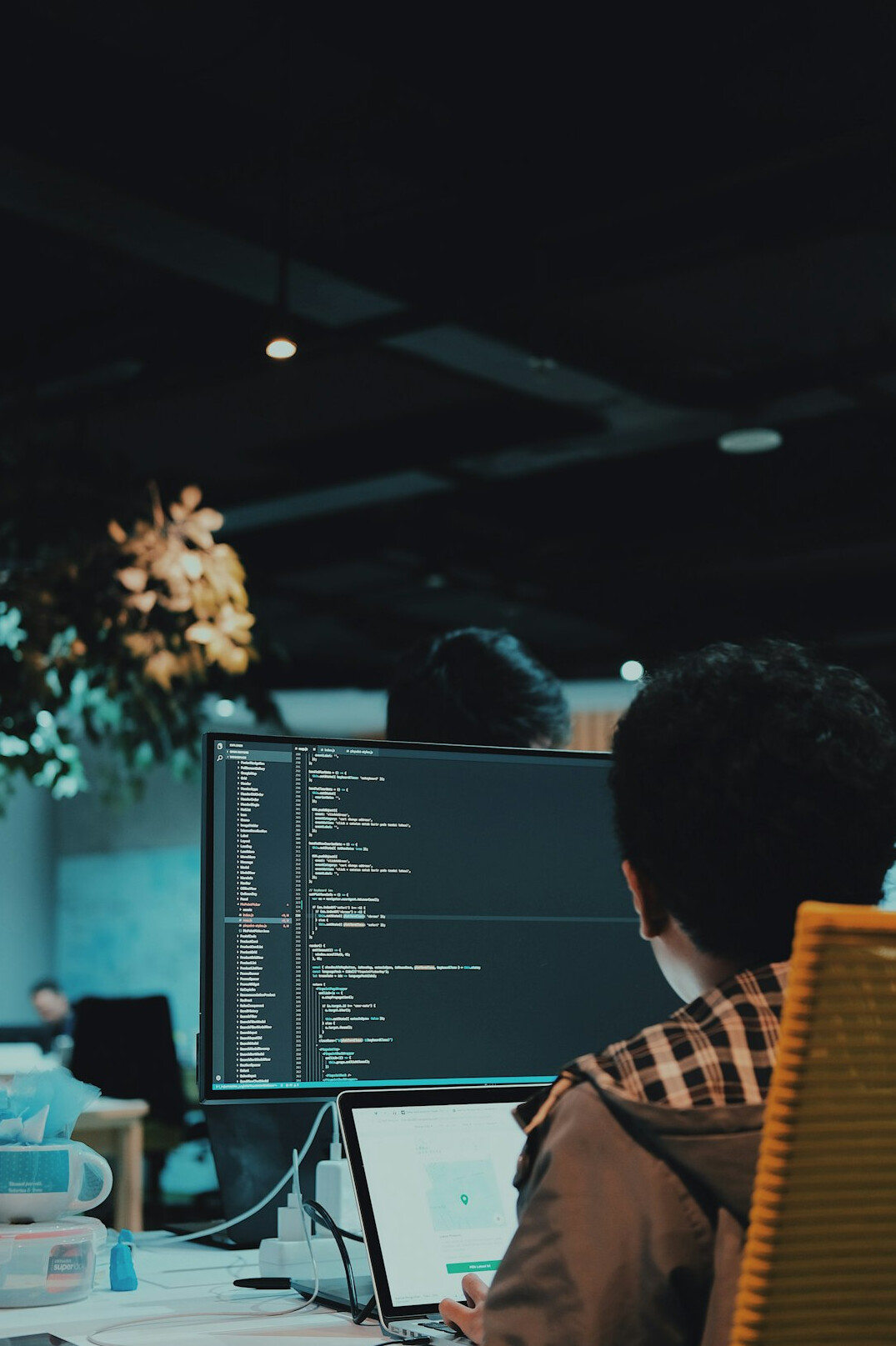 young person learning to code