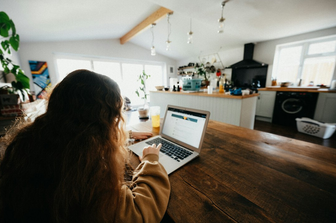 person coding confidently at home